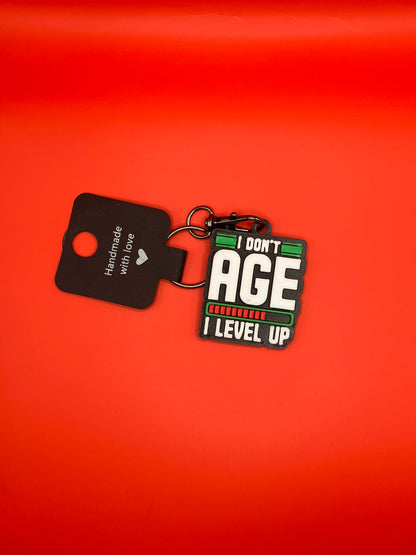 Keyring - "I don't age I level up" - Innov8Print3D