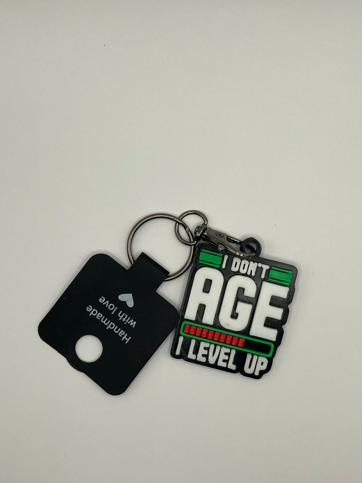 Keyring - "I don't age I level up" - Innov8Print3D